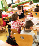 stock-photo-56553292-little-boys-talking-in-the-classroom